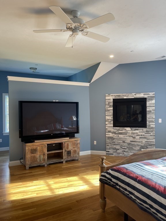 21 Gibbs Road Berlin, MA 01503 - Photo 12 of 29 a living room with furniture and a flat screen tv
