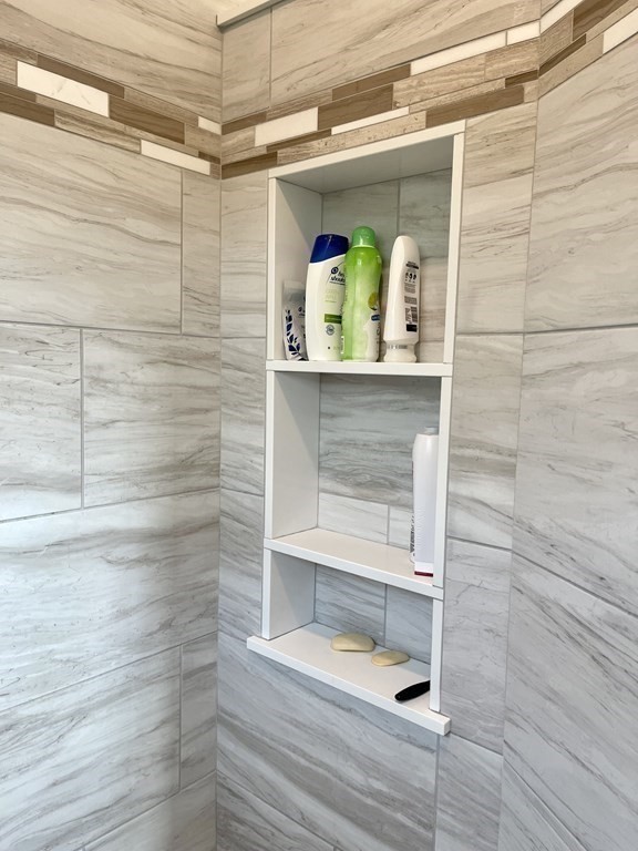 21 Gibbs Road Berlin, MA 01503 - Photo 16 of 29 a bathroom with a bathtub and shower