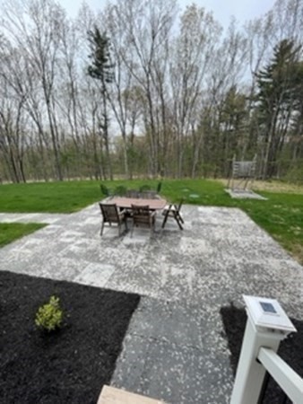 21 Gibbs Road Berlin, MA 01503 - Photo 23 of 29 a view of backyard with seating area and green space