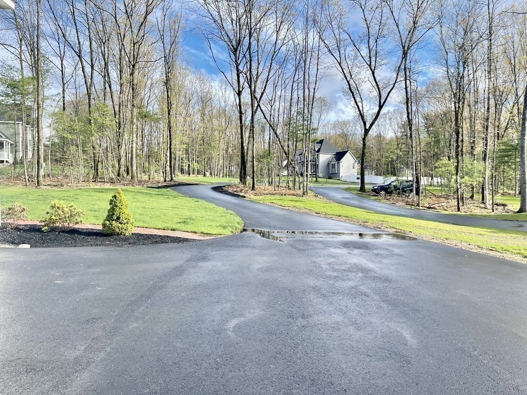 21 Gibbs Road Berlin, MA 01503 - Photo 26 of 29 a view of a playground with basketball court