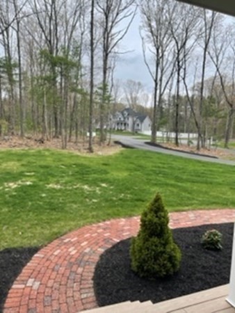 21 Gibbs Road Berlin, MA 01503 - Photo 3 of 29 a garden view with a fountain