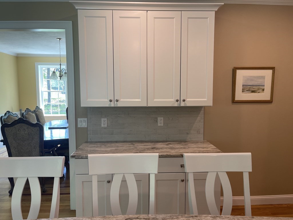 21 Gibbs Road Berlin, MA 01503 - Photo 9 of 29 a bathroom with a sink and cabinets