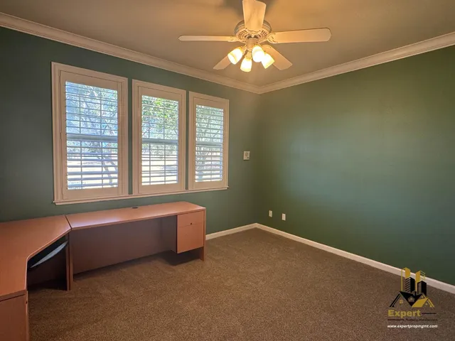 a spacious bathroom with a bathtub and a window