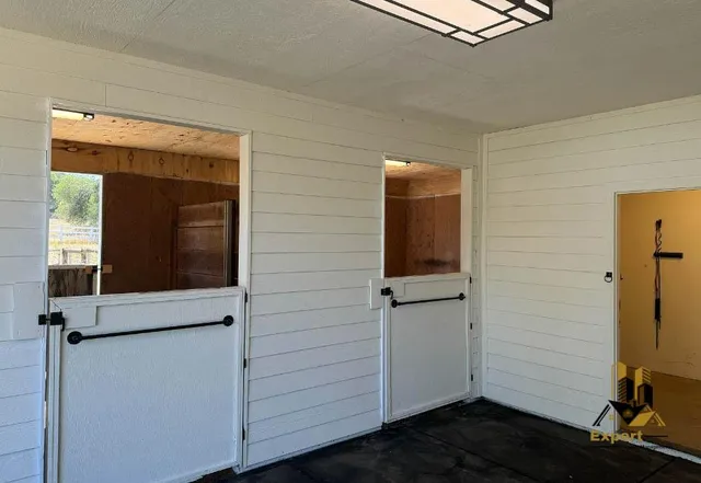 a view of a patio with swimming pool