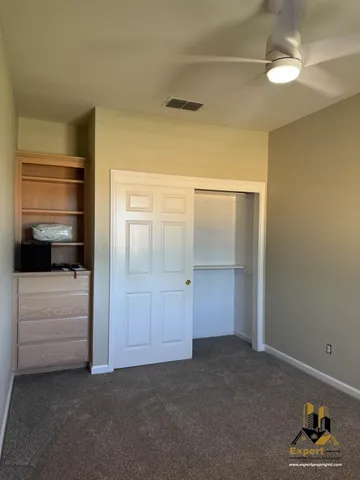 a living room with closet