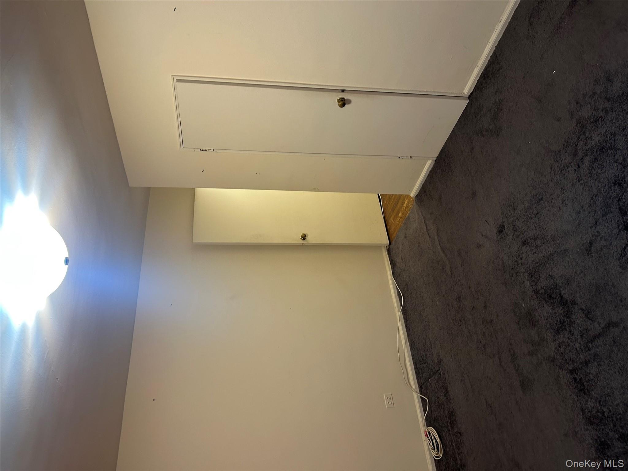 83-25 98th Street, Unit 2C Queens, NY 11421 - Photo 17 of 18 an empty room with an empty space