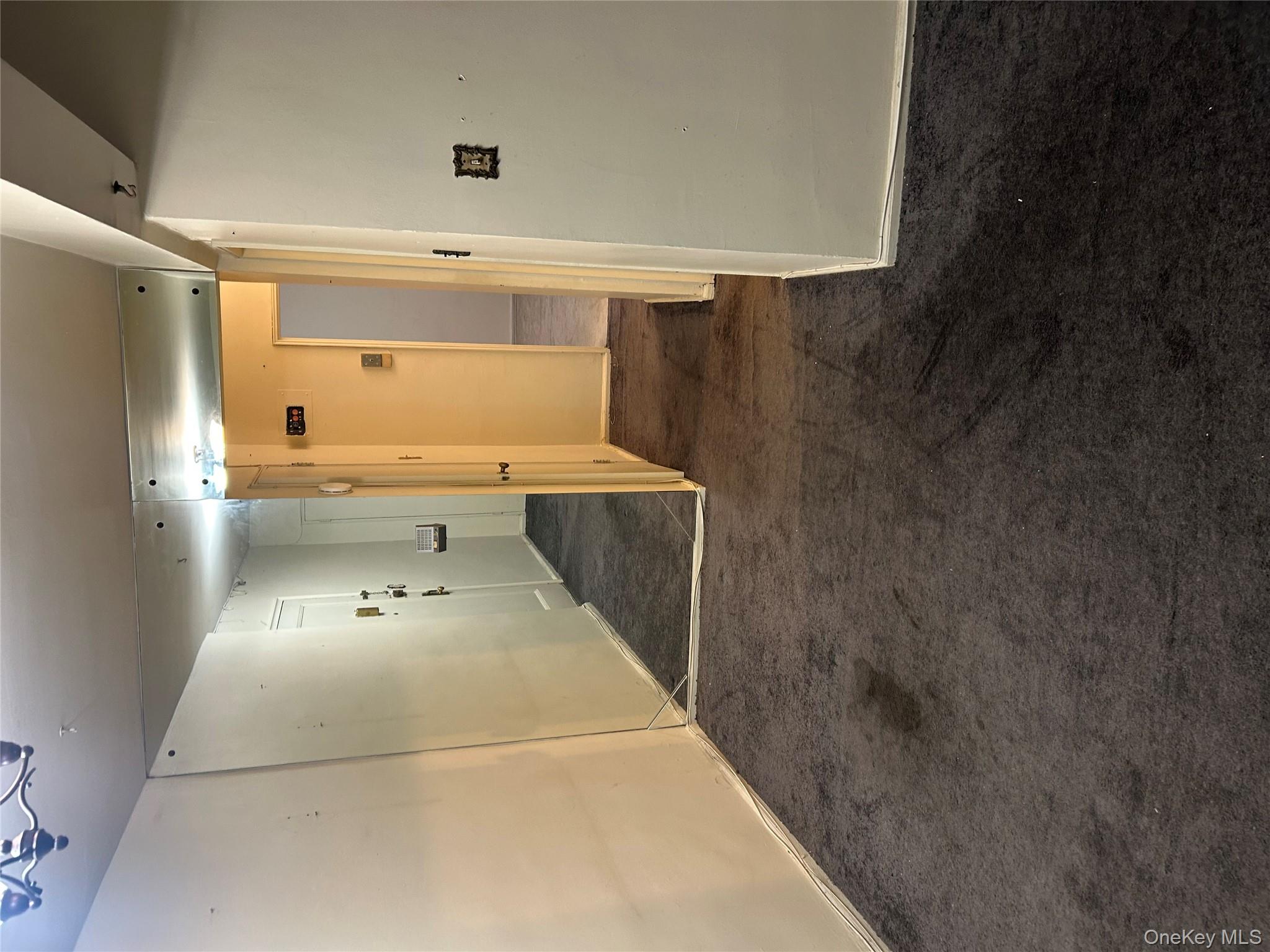 83-25 98th Street, Unit 2C Queens, NY 11421 - Photo 6 of 18 a view of a hallway with an empty room