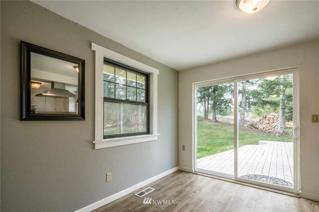 5215 Everson Goshen Road Bellingham, WA 98226 - Photo 19 of 25 a view of an empty room with a window