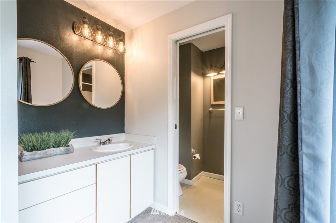 5215 Everson Goshen Road Bellingham, WA 98226 - Photo 22 of 25 a bathroom with a sink and a mirror