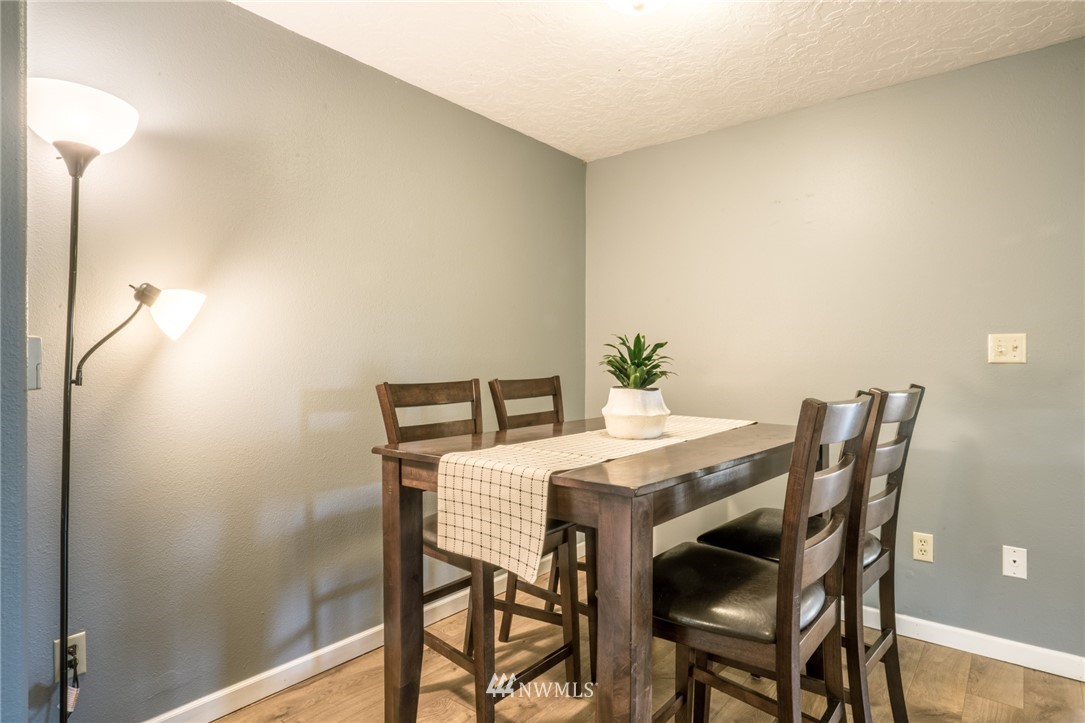 5215 Everson Goshen Road Bellingham, WA 98226 - Photo 8 of 25 a dining room with furniture and wooden floor