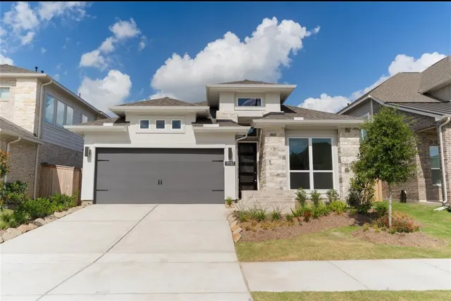 a front view of a house with entertaining space