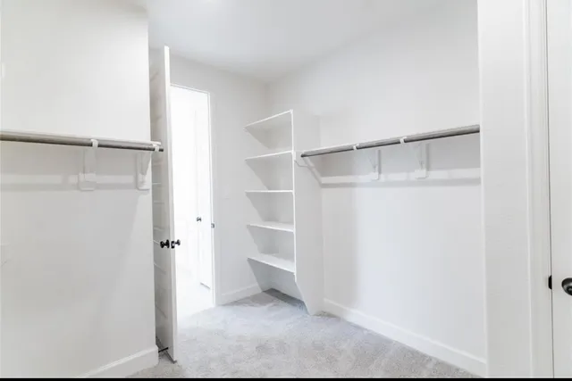 a view of an empty walk in closet