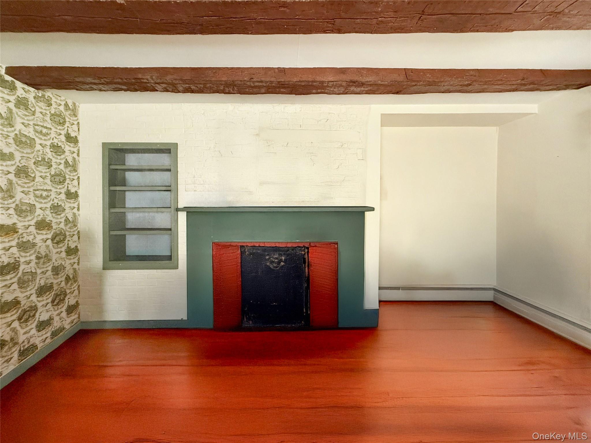 4 Plains Road Walden, NY 12586 - Photo 16 of 31 a view of empty room with window and fireplace