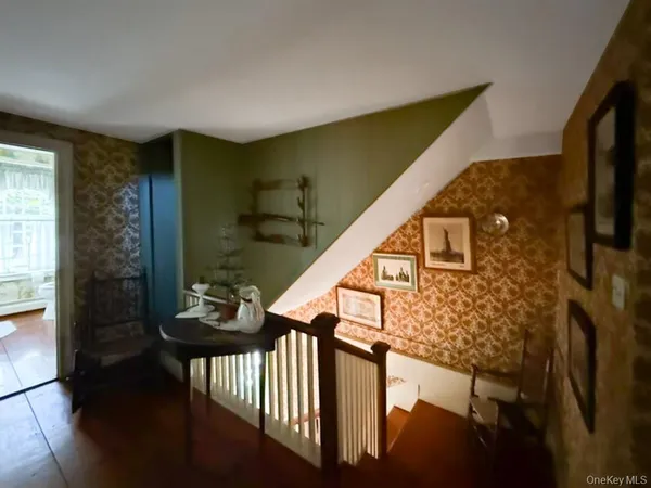 a stair with table and chairs