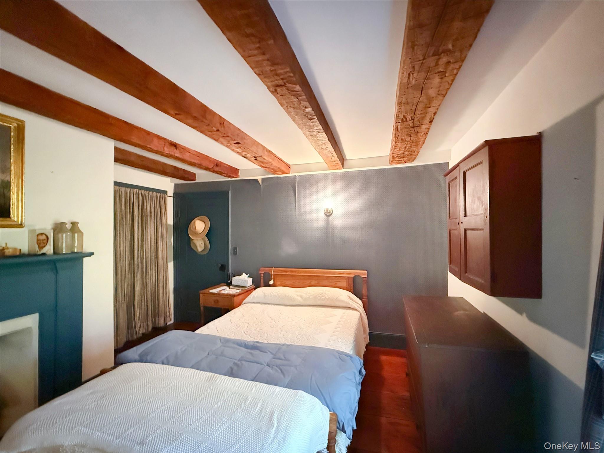 4 Plains Road Walden, NY 12586 - Photo 26 of 31 a bedroom with a bed and a large window