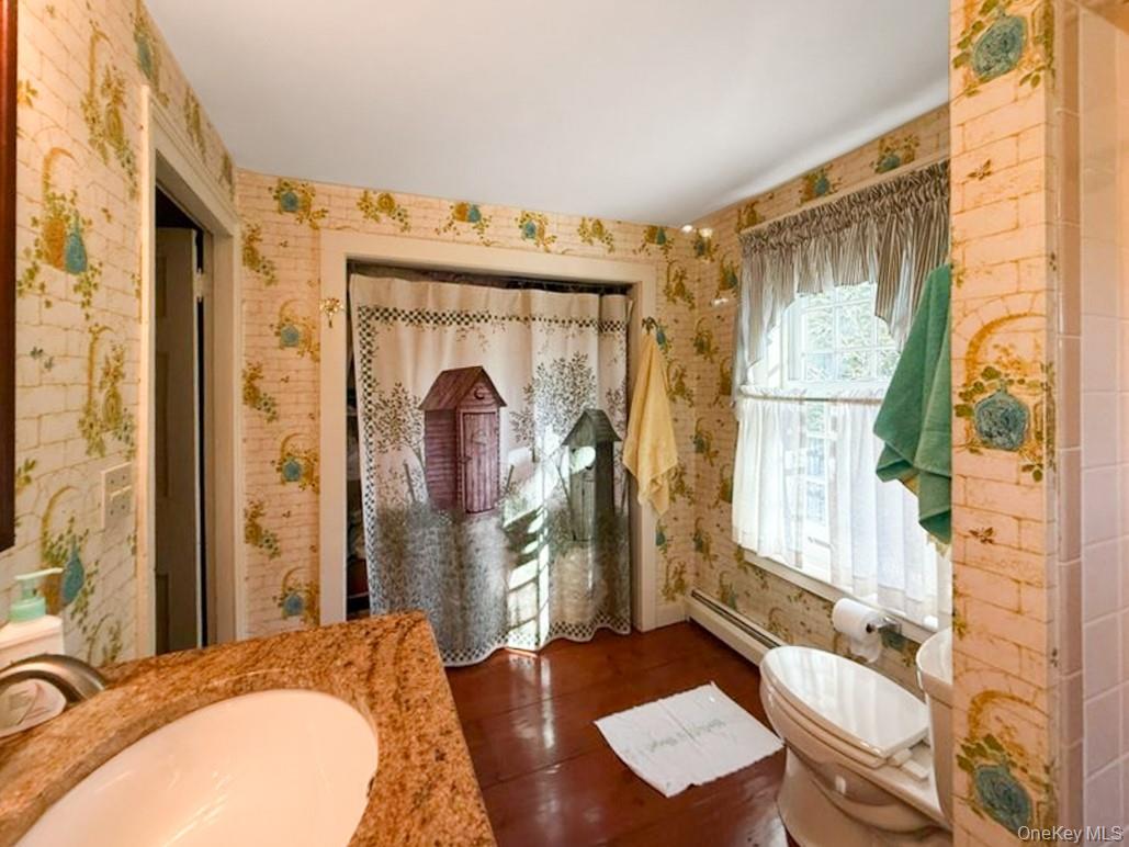 4 Plains Road Walden, NY 12586 - Photo 29 of 31 a bathroom with a granite countertop sink and a mirror