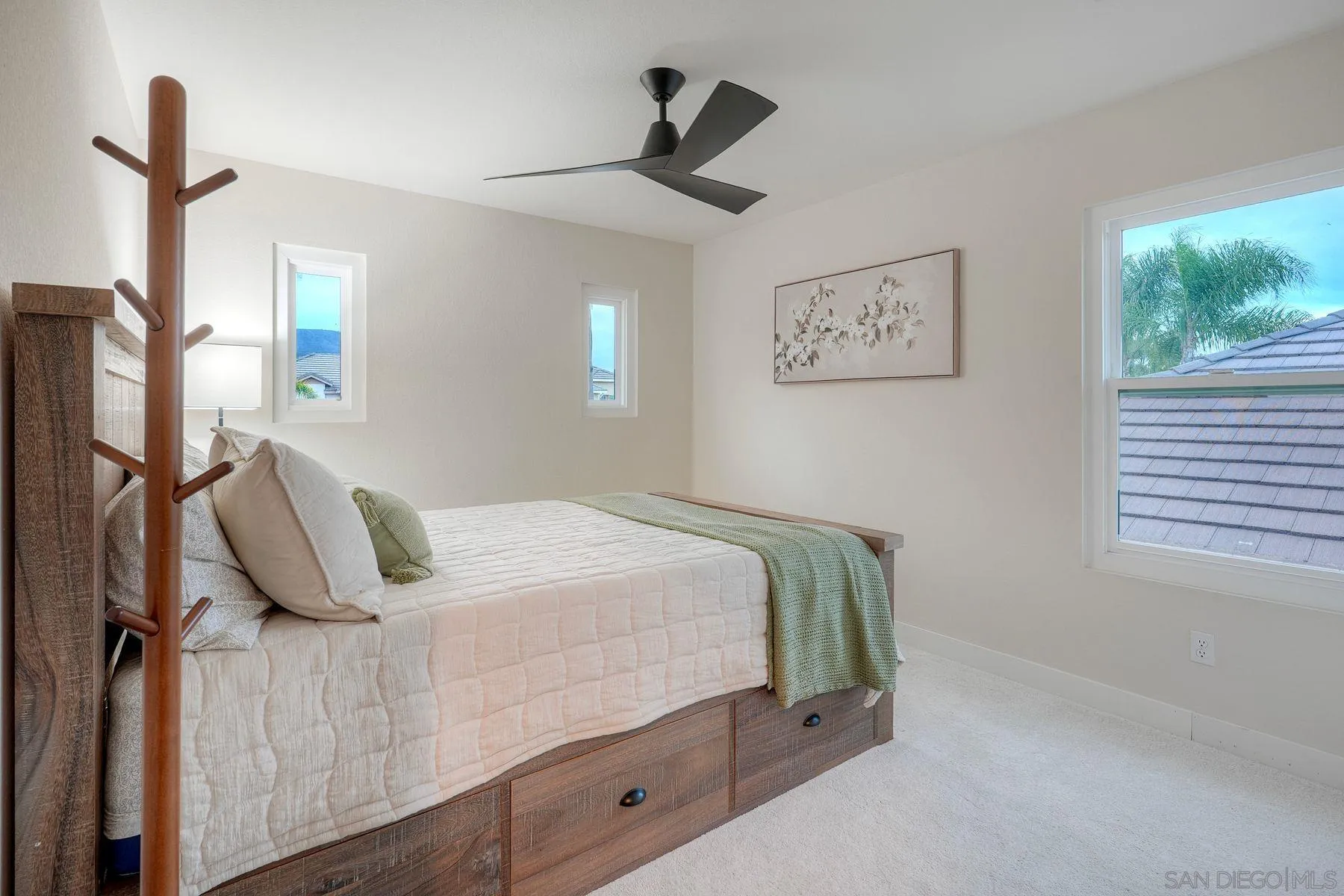 529 Peach Tree Way San Marcos, CA 92069 - Photo 17 of 30 a bedroom with bed and window