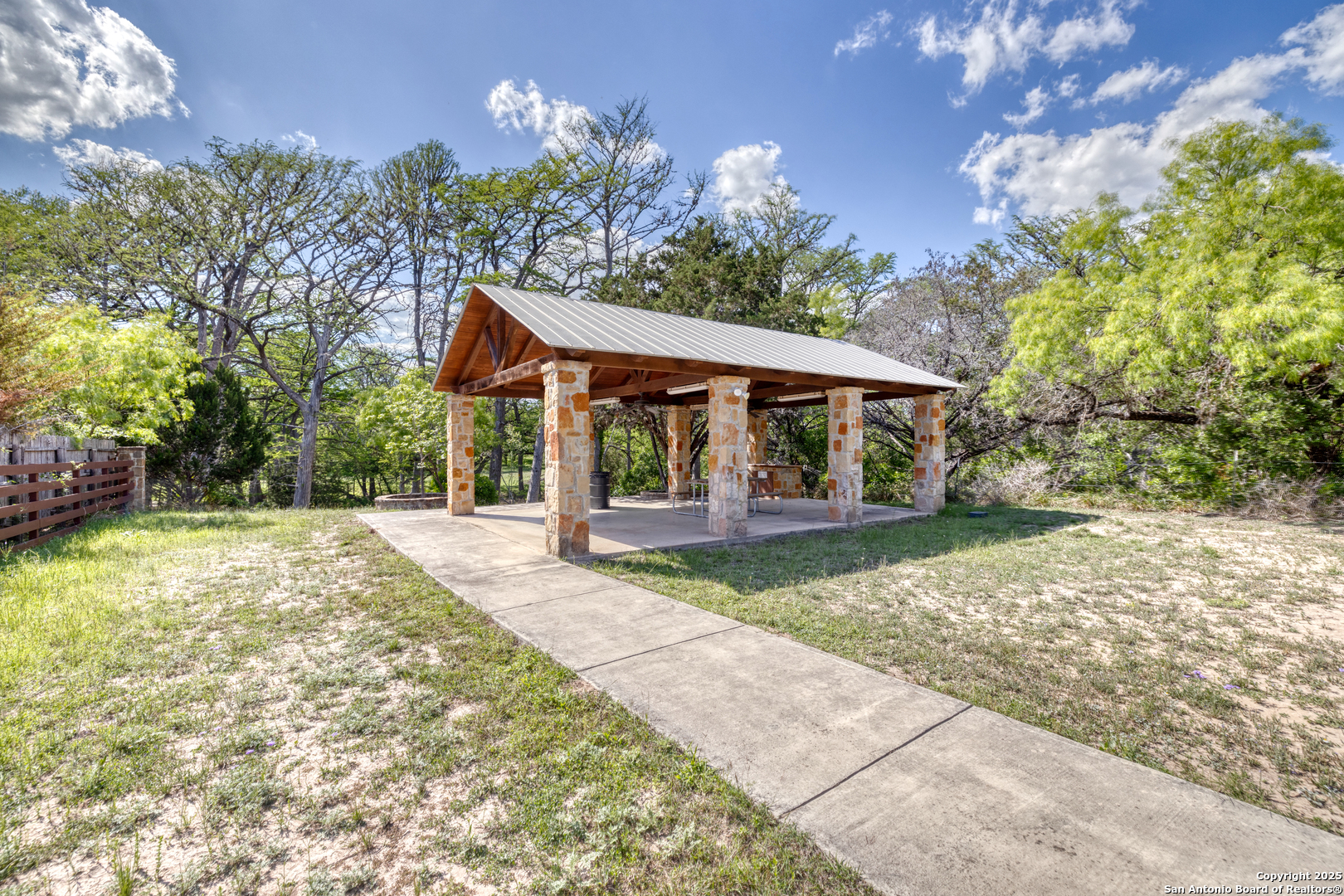 405 Ridge Loop Rio Frio, TX 78879 - Photo 11 of 32 a view of a house with a yard and tree s