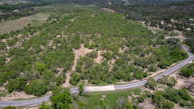 a view of a lake from a balcony