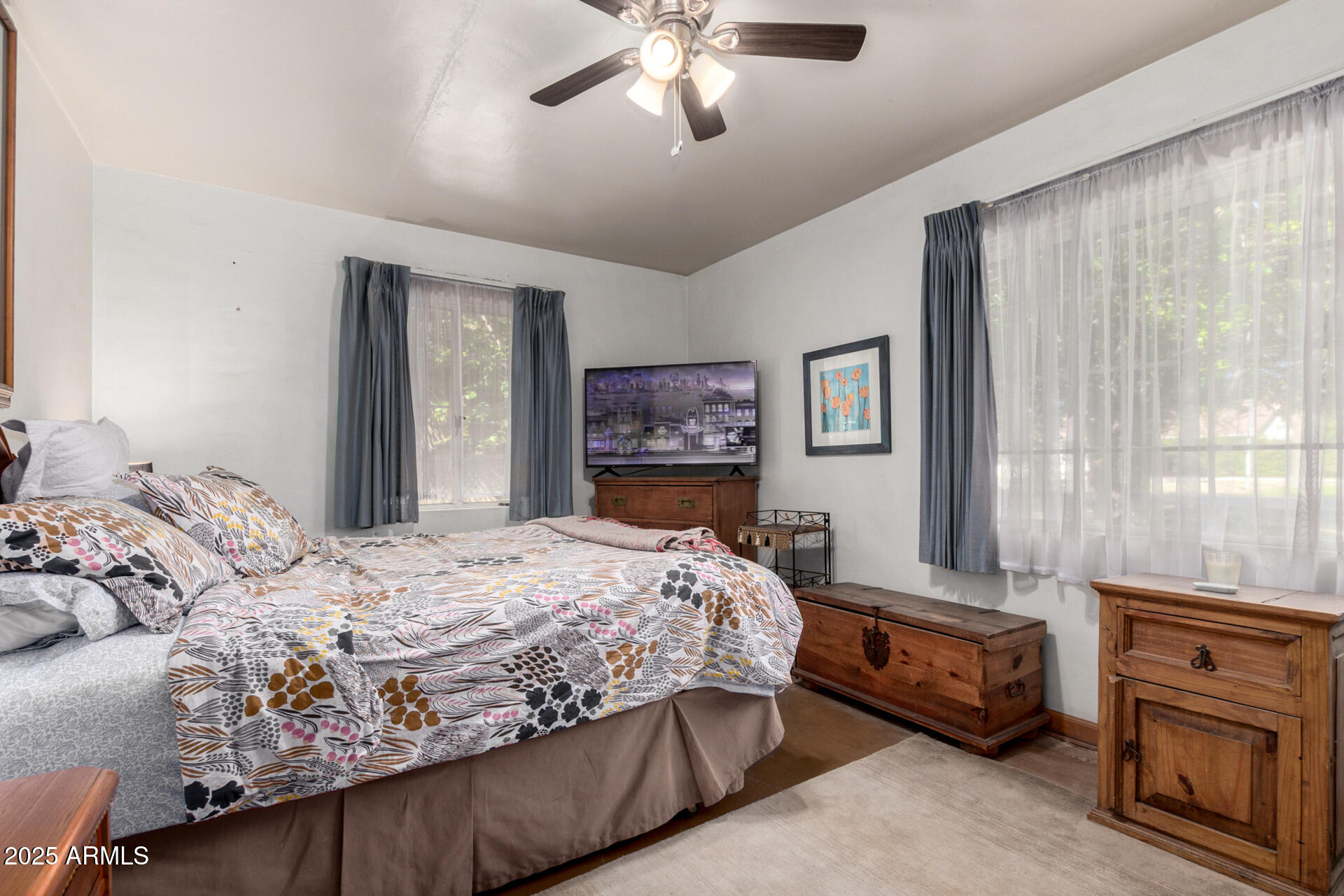 37 West Pasadena Avenue Phoenix, AZ 85013 - Photo 12 of 37 a bedroom with a bed and a chandelier