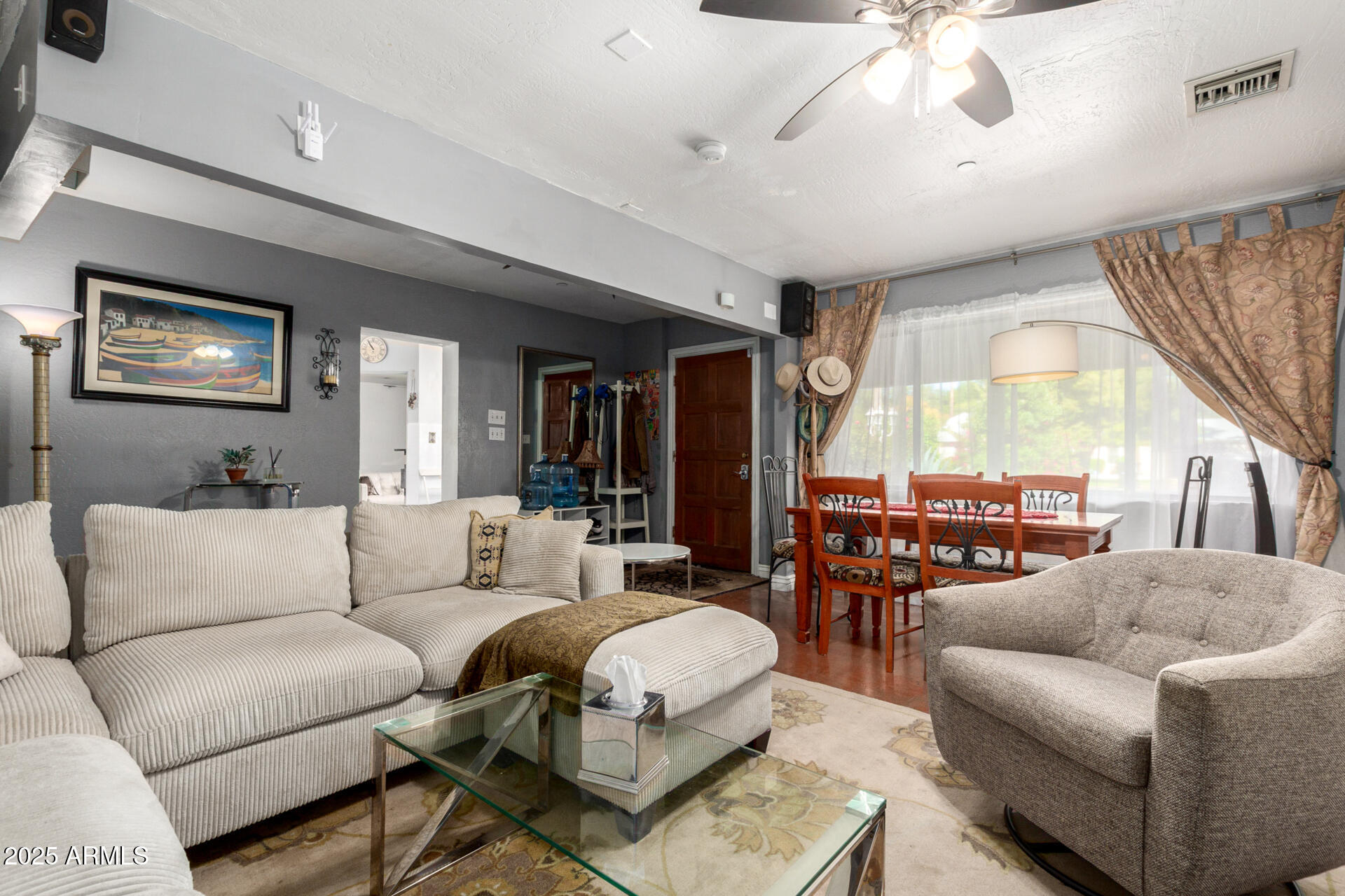 37 West Pasadena Avenue Phoenix, AZ 85013 - Photo 15 of 37 a living room with furniture and a large window