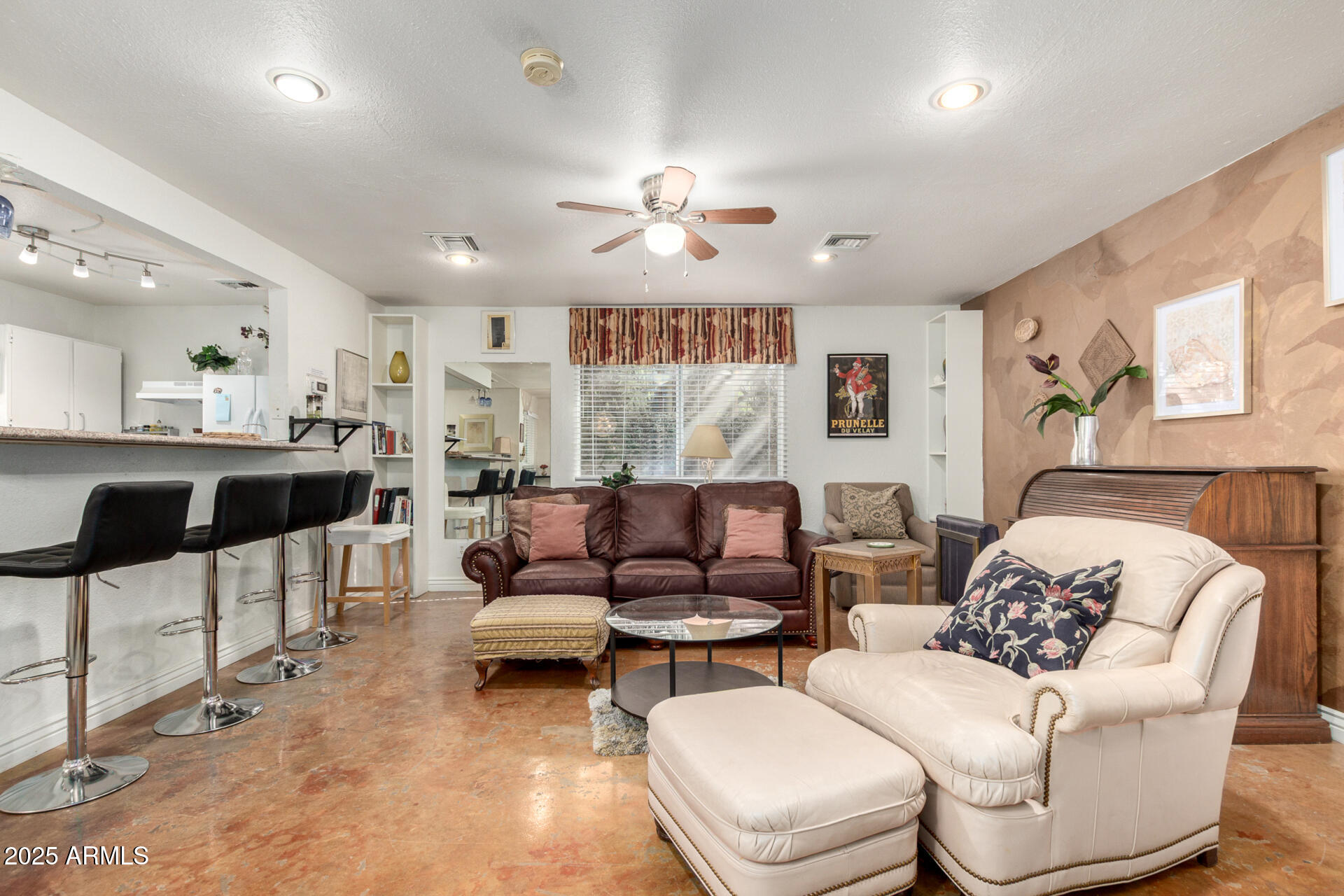 37 West Pasadena Avenue Phoenix, AZ 85013 - Photo 16 of 37 a living room with furniture and a chandelier