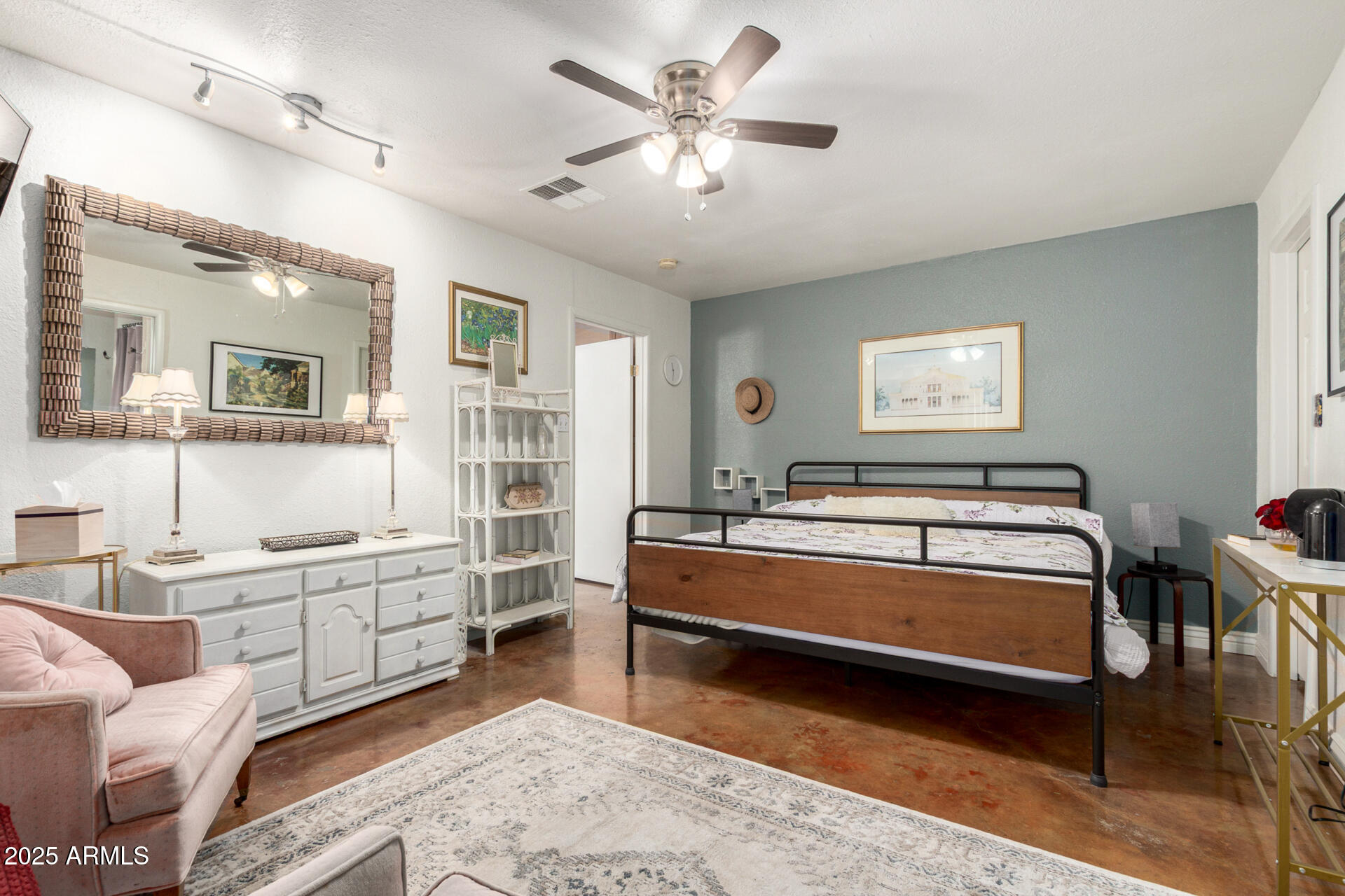 37 West Pasadena Avenue Phoenix, AZ 85013 - Photo 20 of 37 a spacious bedroom with a bed and a chandelier
