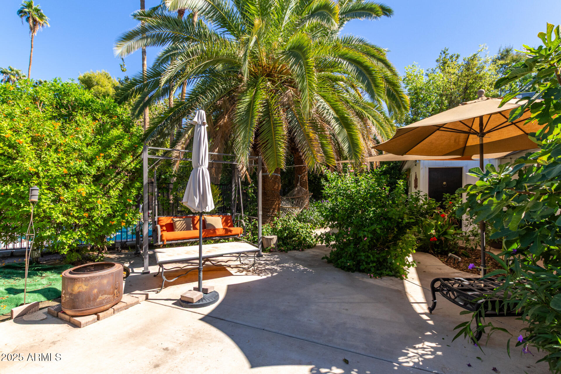 37 West Pasadena Avenue Phoenix, AZ 85013 - Photo 24 of 37 a backyard of a house with outdoor seating