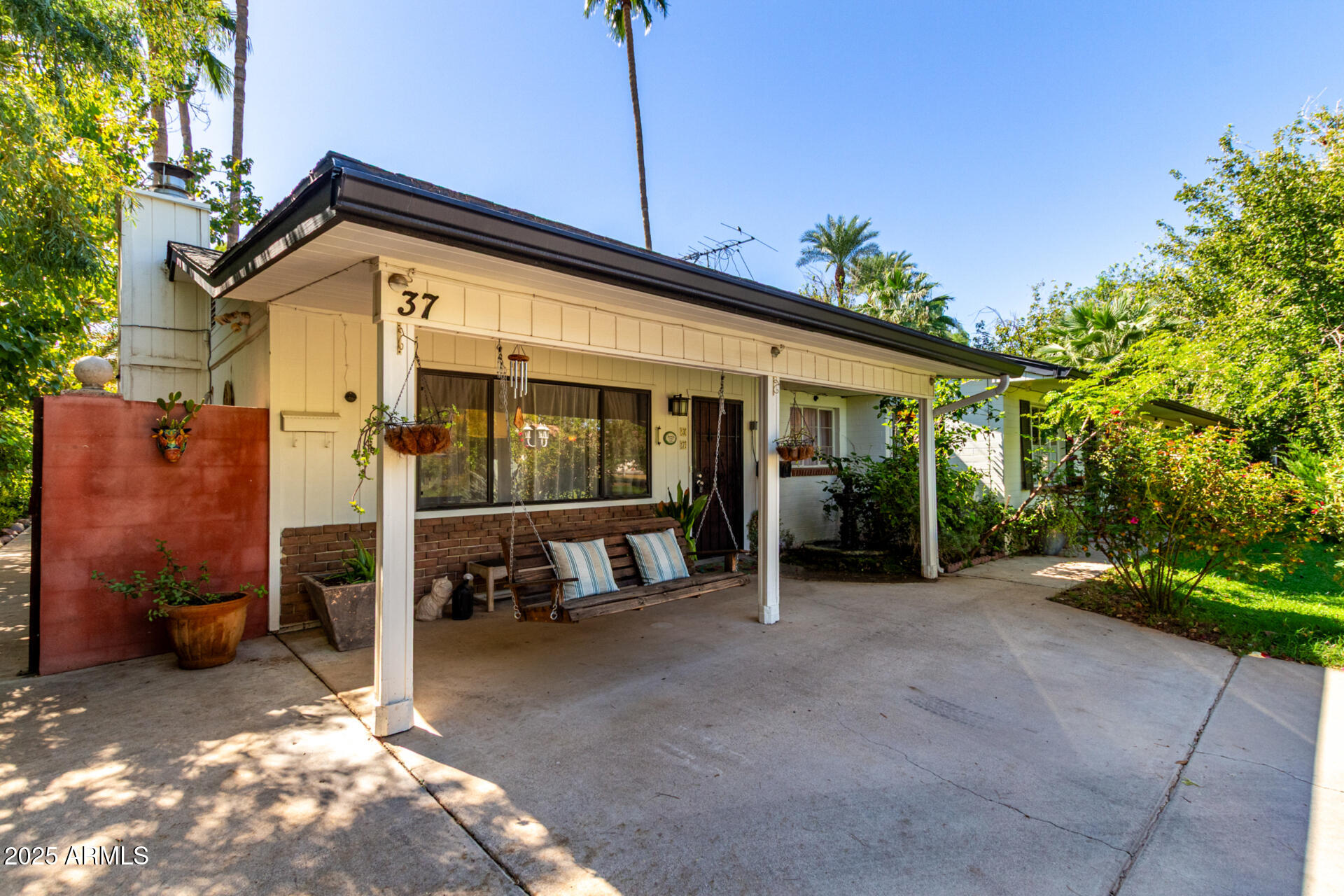 37 West Pasadena Avenue Phoenix, AZ 85013 - Photo 25 of 37 a view of a house with backyard porch and sitting area