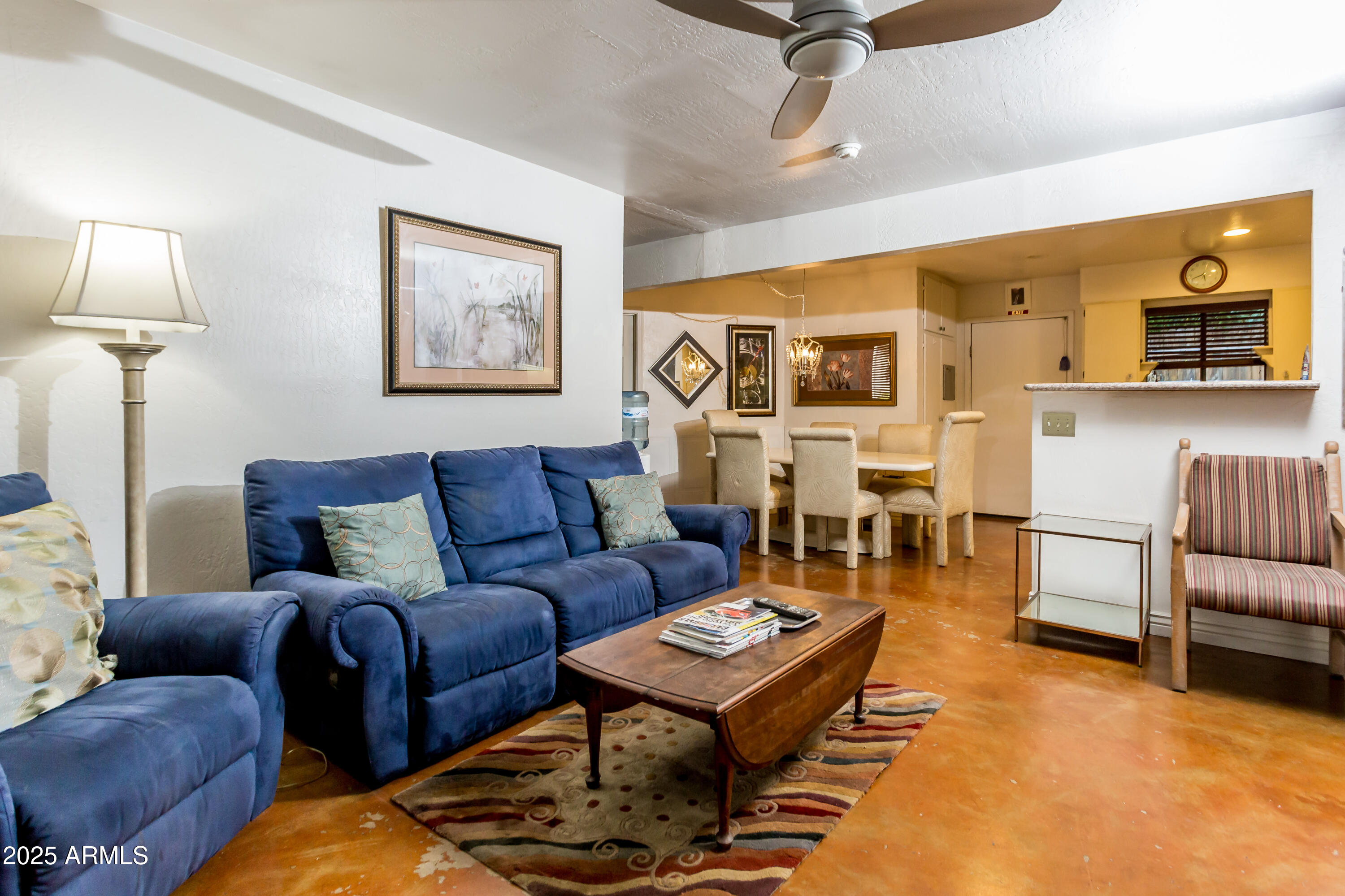 37 West Pasadena Avenue Phoenix, AZ 85013 - Photo 6 of 37 a living room with furniture and wooden floor