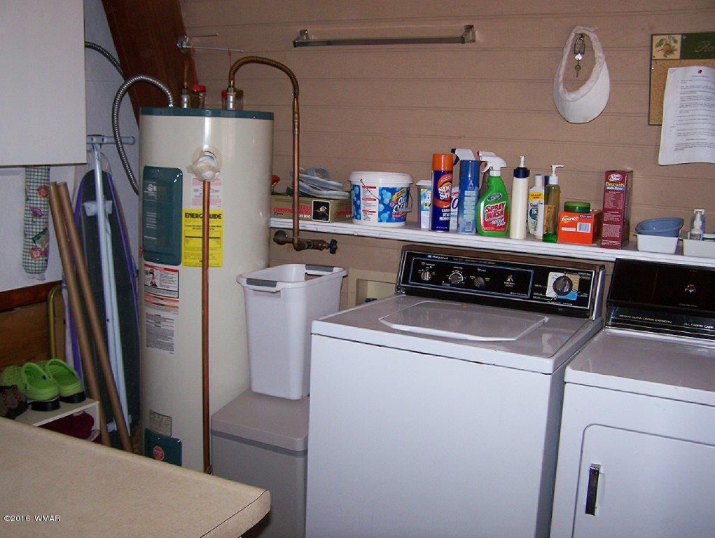 3156 Chevelon Road Overgaard, AZ 85933 - Photo 15 of 46 a utility room with dryer and washer