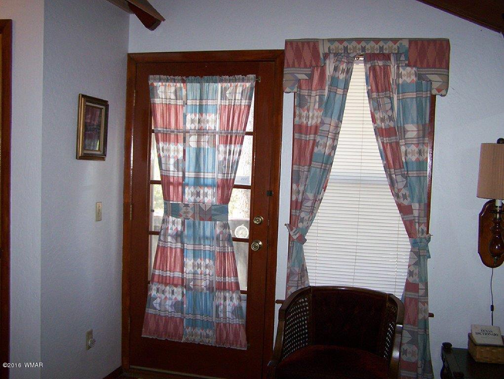 3156 Chevelon Road Overgaard, AZ 85933 - Photo 18 of 46 a view of a front door