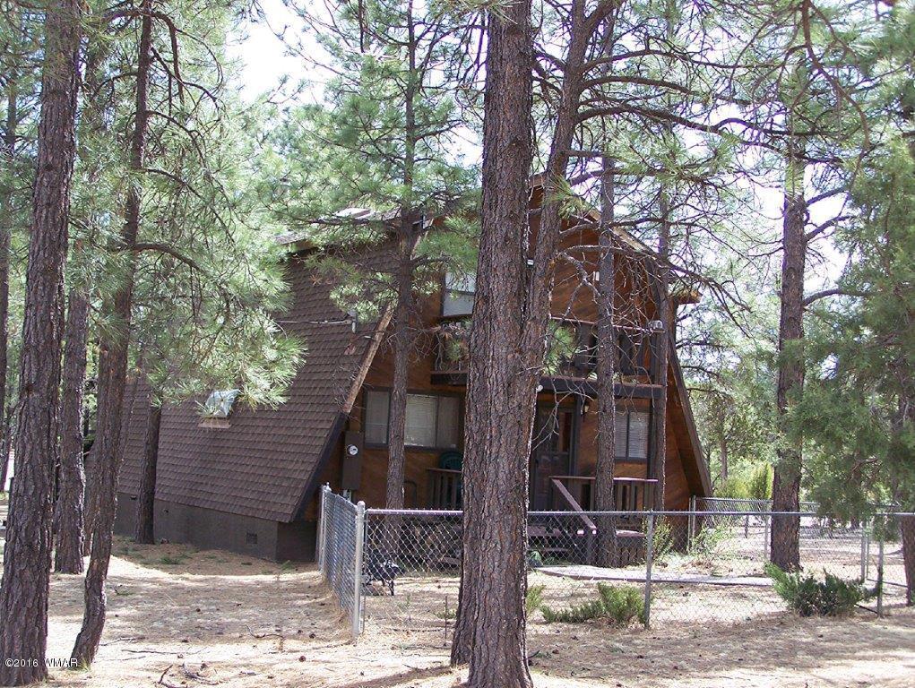 3156 Chevelon Road Overgaard, AZ 85933 - Photo 42 of 46 a sign board with tree in the background