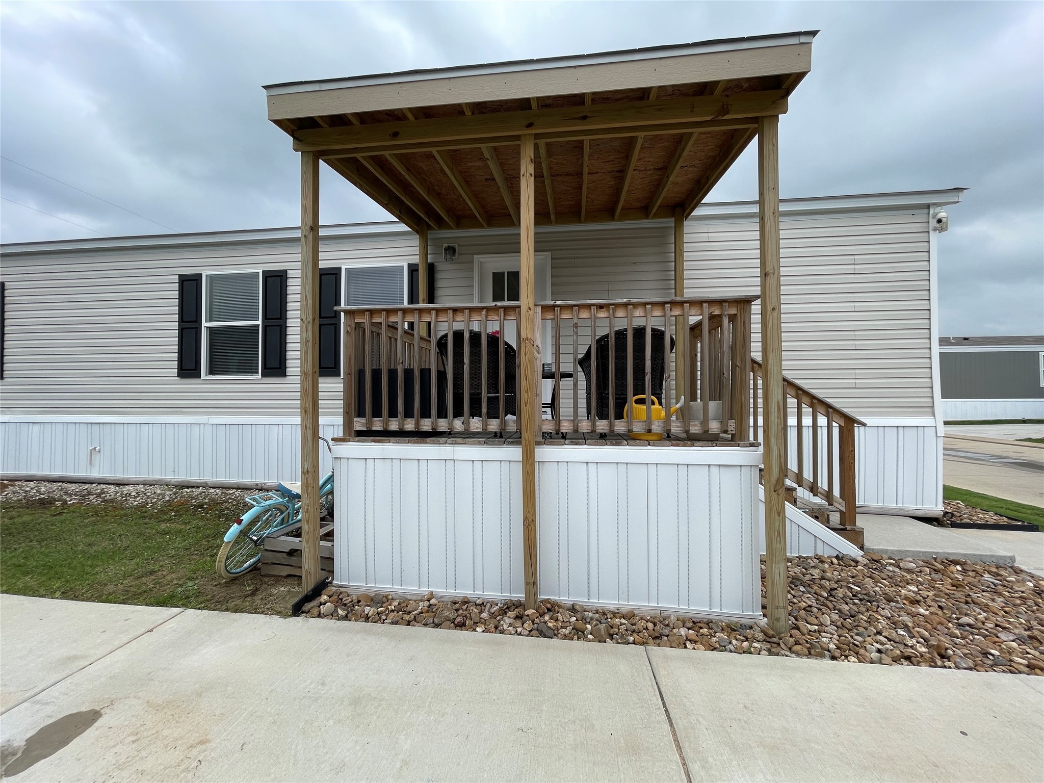 20410 Telge Road, Unit 144 Tomball, TX 77377 - Photo 2 of 20 front view of a house with a fence