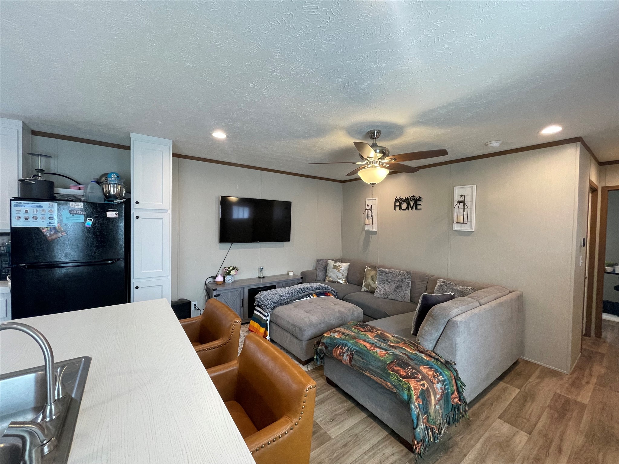 20410 Telge Road, Unit 144 Tomball, TX 77377 - Photo 9 of 20 a living room with furniture and a flat screen tv