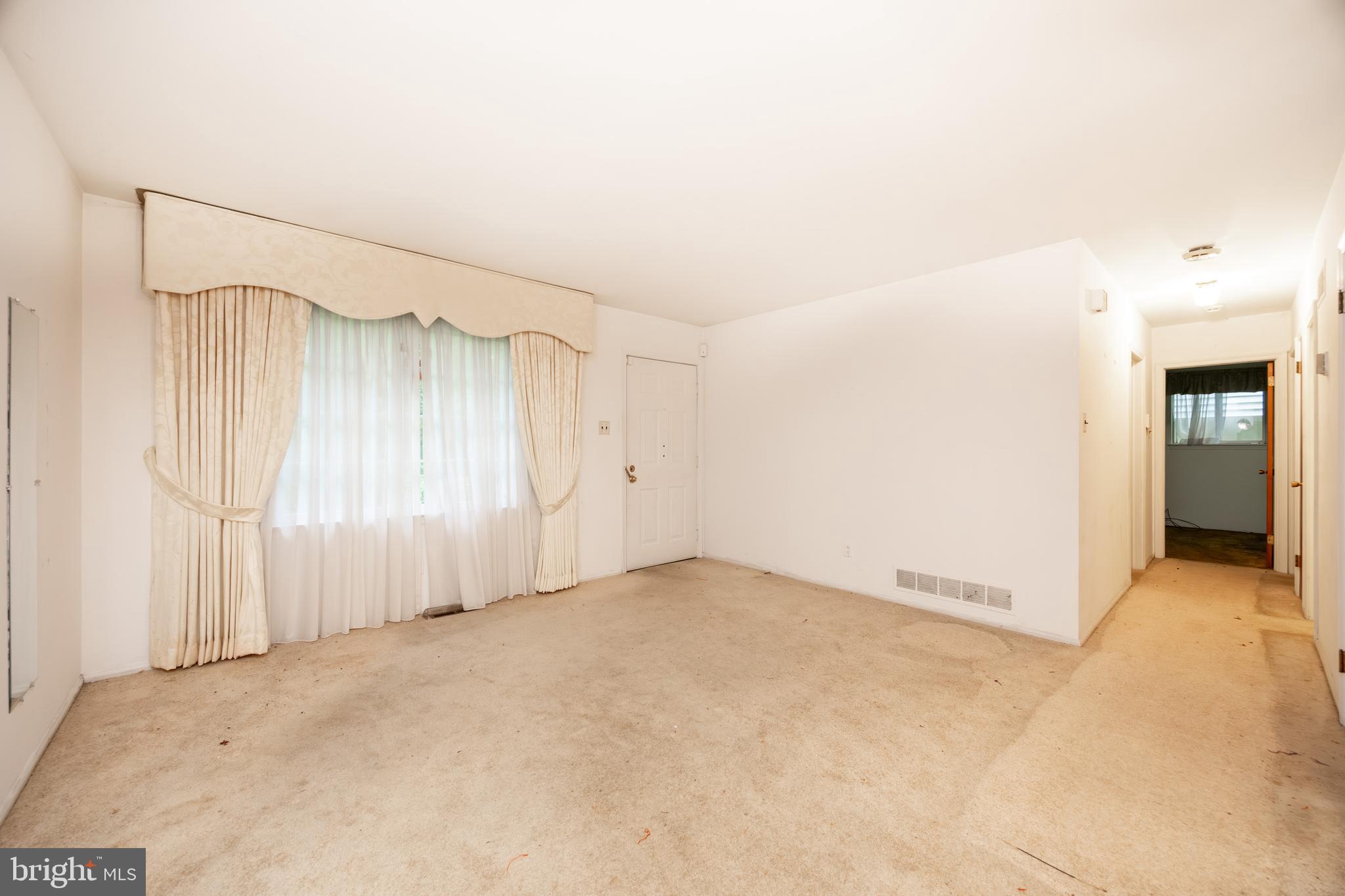 108 Cambridge Road Coatesville, PA 19320 - Photo 3 of 16 a view of an empty room