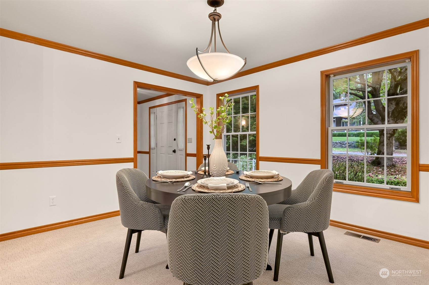 662 Clark Road Bellingham, WA 98225 - Photo 8 of 39 a dining room with furniture a chandelier and wooden floor