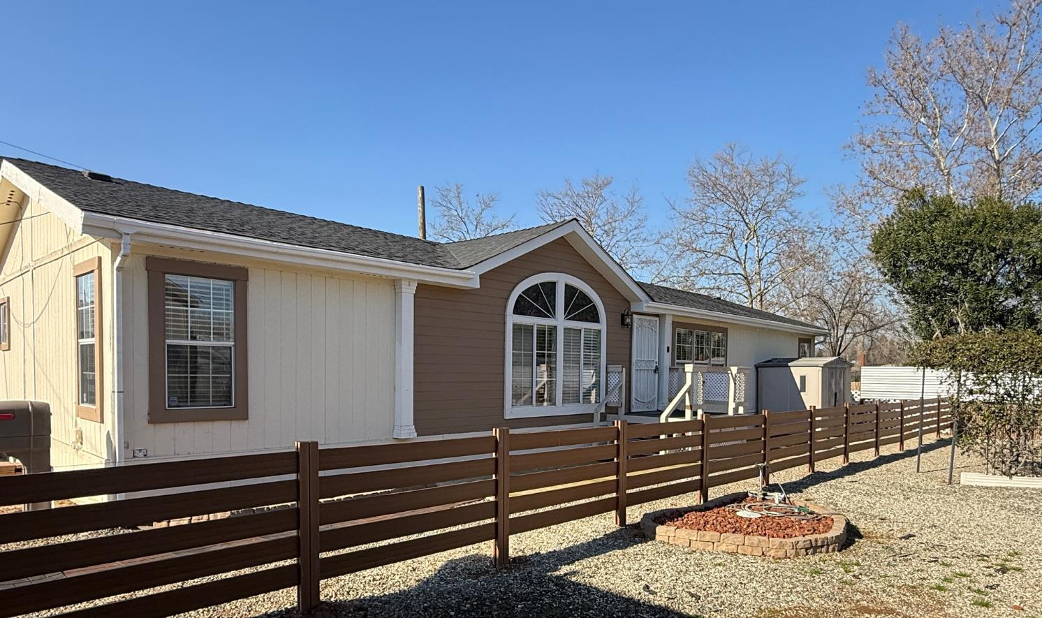 908 Atlantic Street, Unit 33 Roseville, CA 95678 - Photo 2 of 31 a front view of a house with a yard