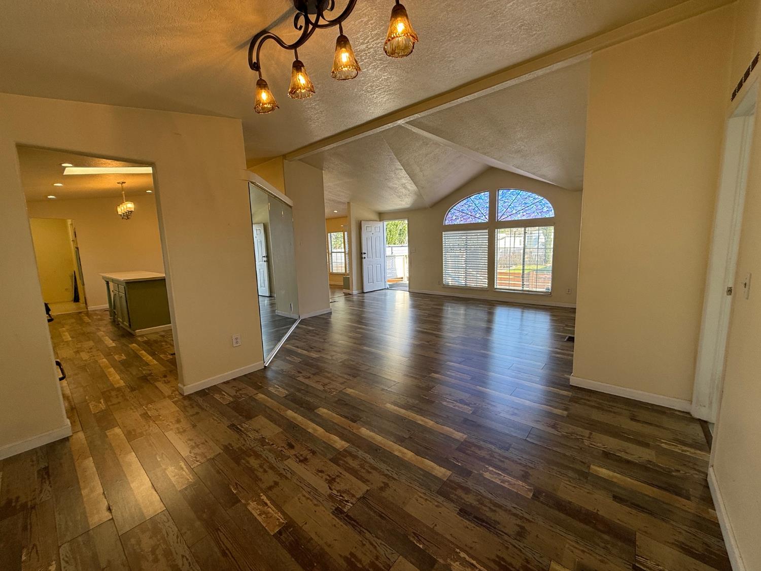 908 Atlantic Street, Unit 33 Roseville, CA 95678 - Photo 26 of 31 a view of empty room with wooden floor and fan