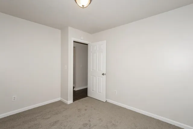 an empty room with closet