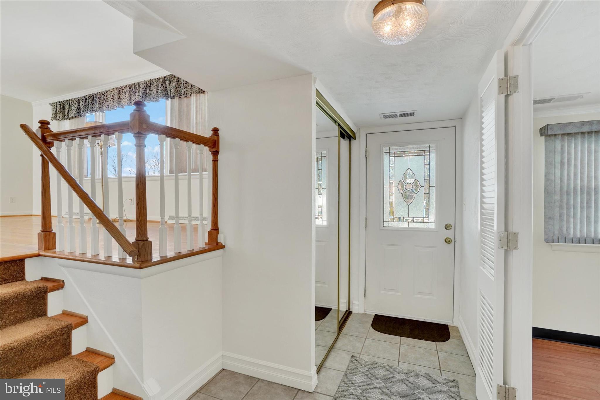 2670 Raleigh Drive York, PA 17402 - Photo 3 of 33 a view of an entryway with wooden floor
