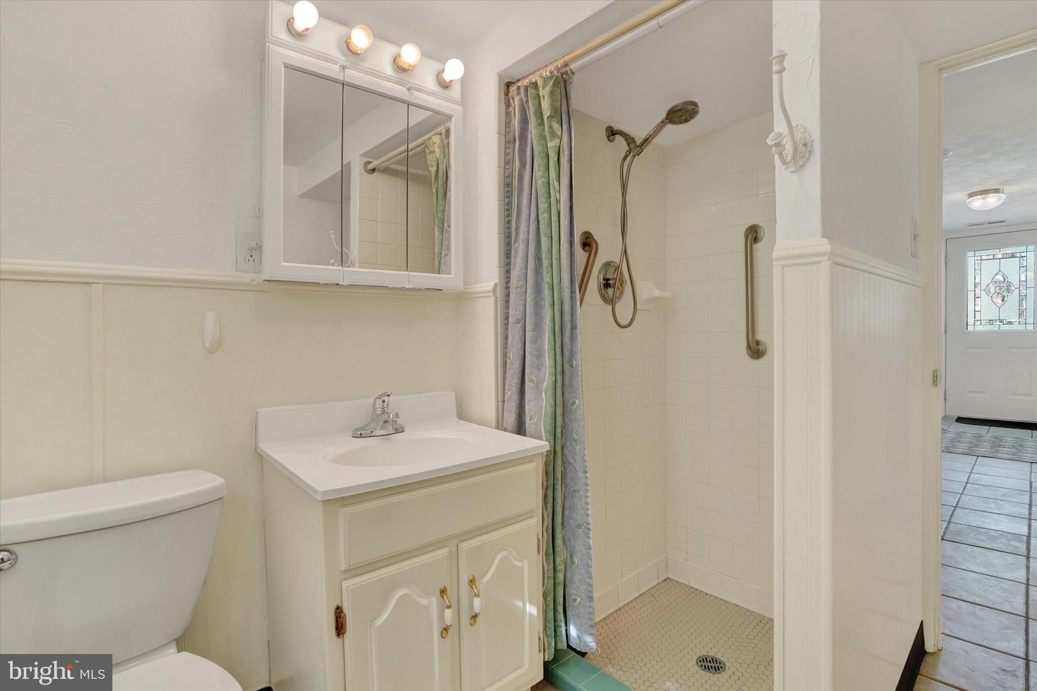 2670 Raleigh Drive York, PA 17402 - Photo 9 of 33 a bathroom with a sink toilet vanity and shower