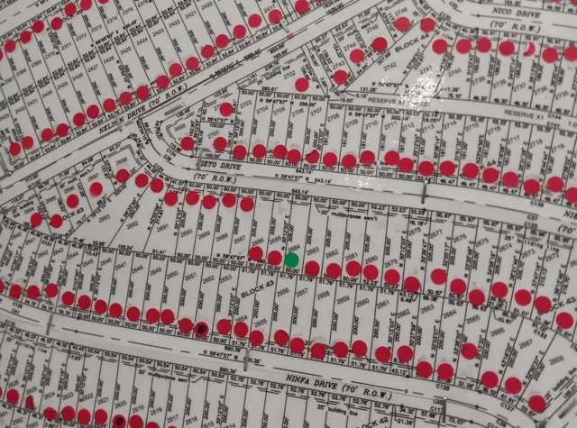 a view of an chairs in front of building