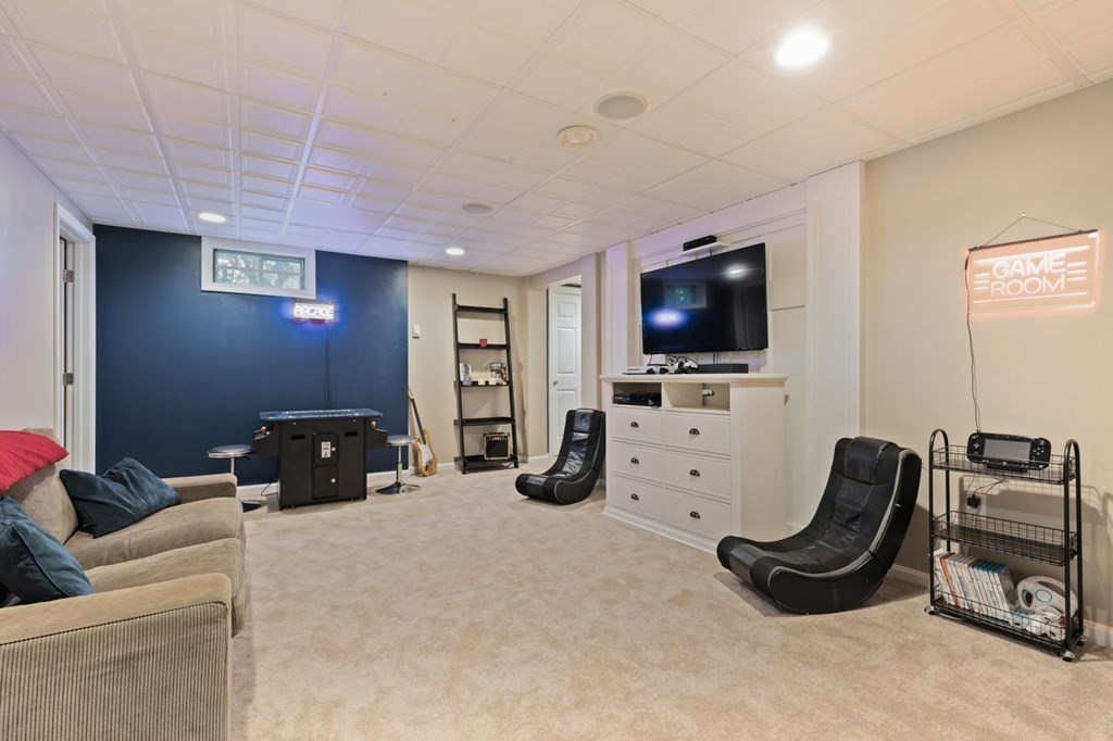 3 Symphony Drive Easton, MA 02356 - Photo 23 of 42 a room with furniture and a flat screen tv