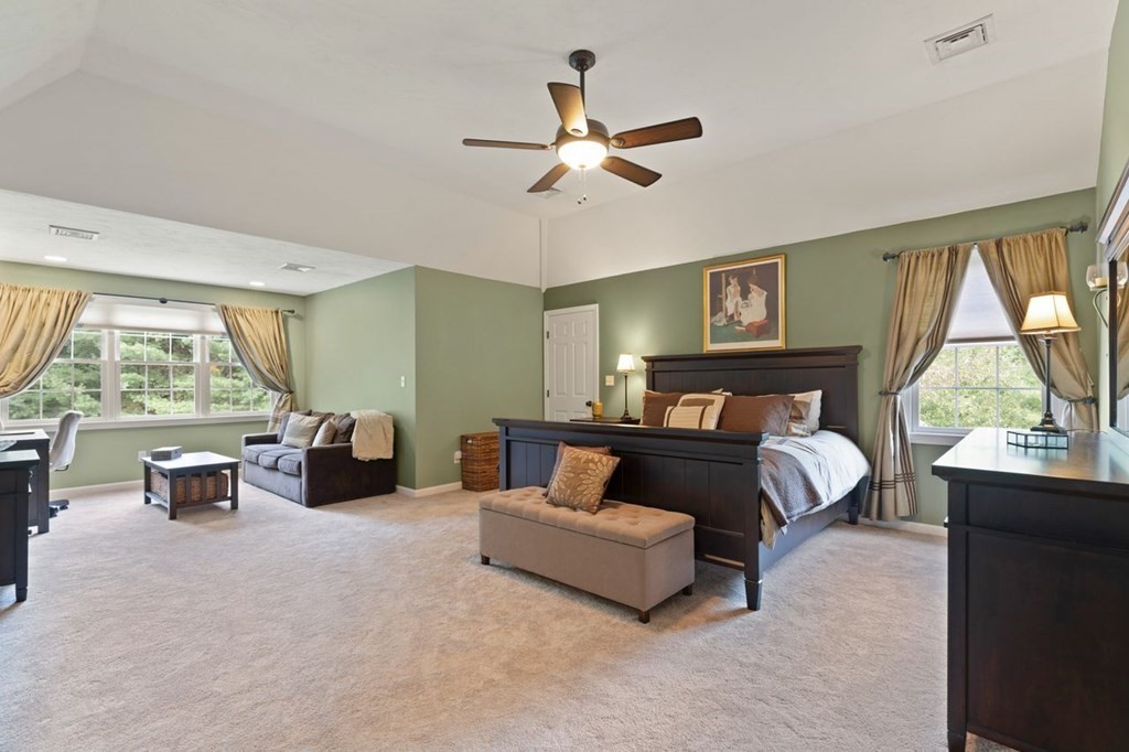 3 Symphony Drive Easton, MA 02356 - Photo 26 of 42 a spacious bedroom with a bed and large window