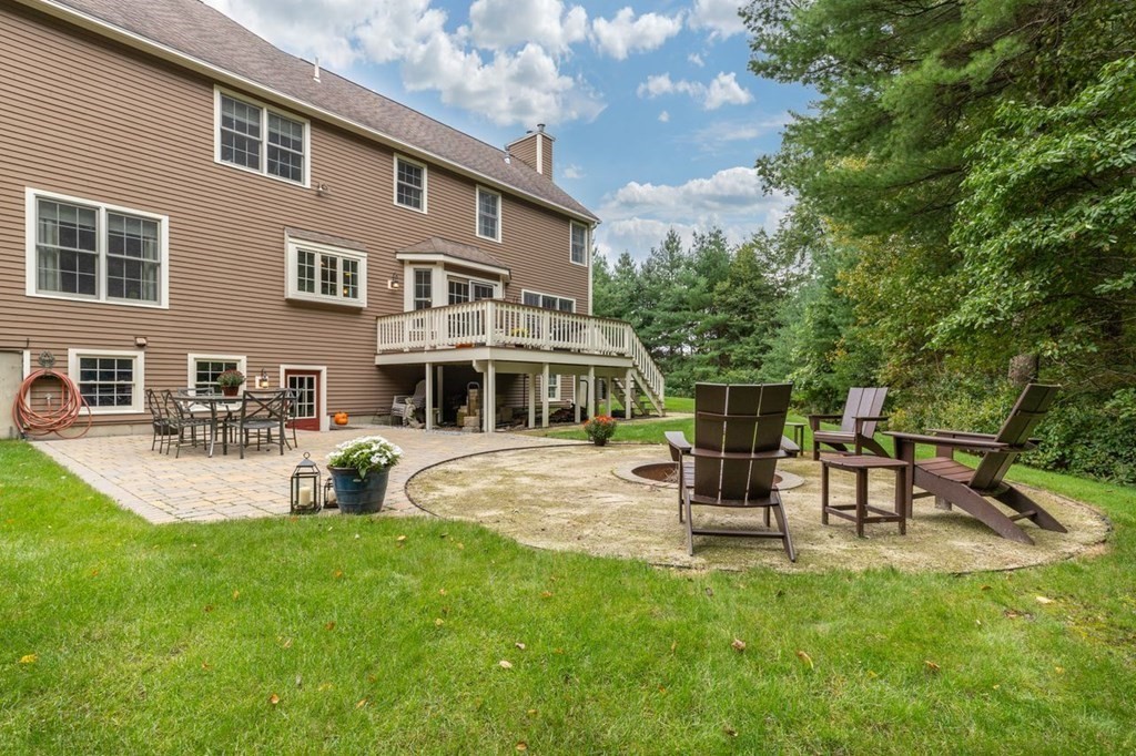 3 Symphony Drive Easton, MA 02356 - Photo 36 of 42 a front view of a house with garden and sitting area