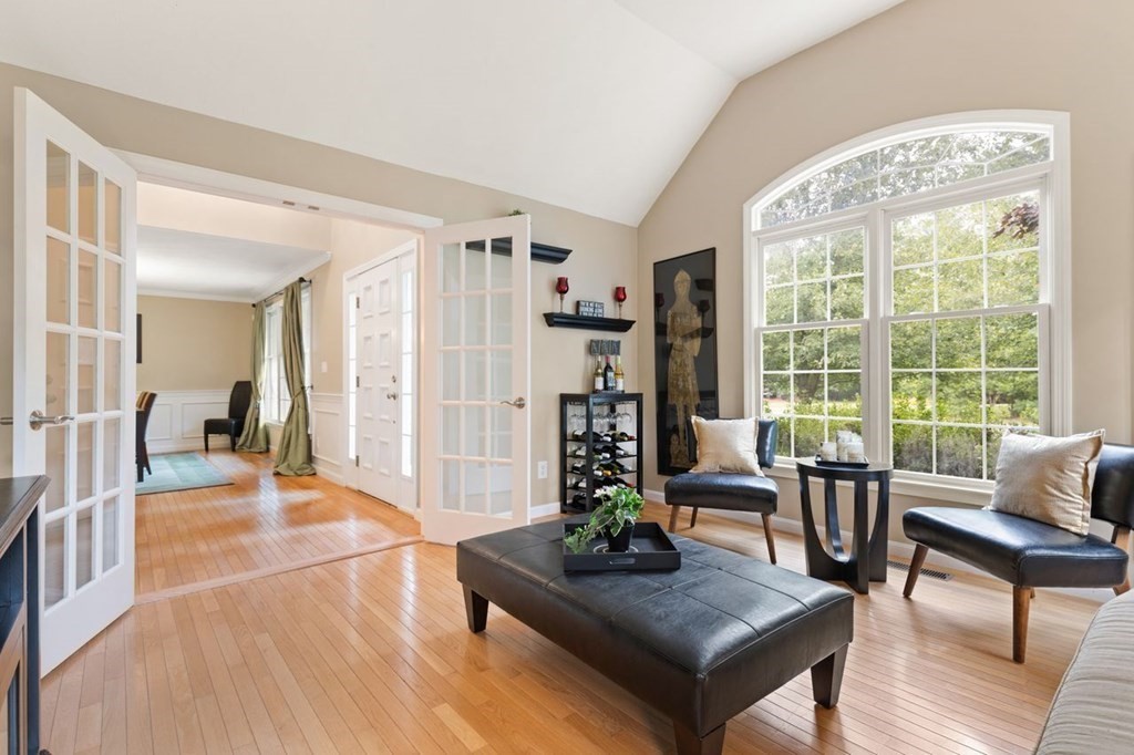 3 Symphony Drive Easton, MA 02356 - Photo 7 of 42 a living room with furniture and large windows