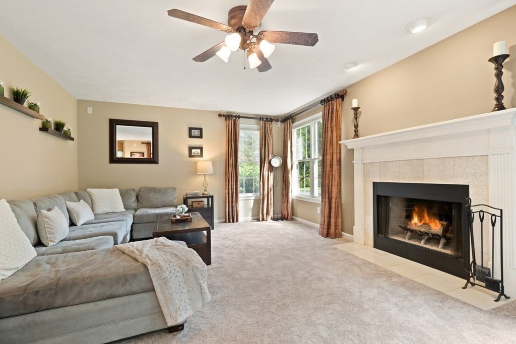3 Symphony Drive Easton, MA 02356 - Photo 9 of 42 a living room with furniture and a fireplace