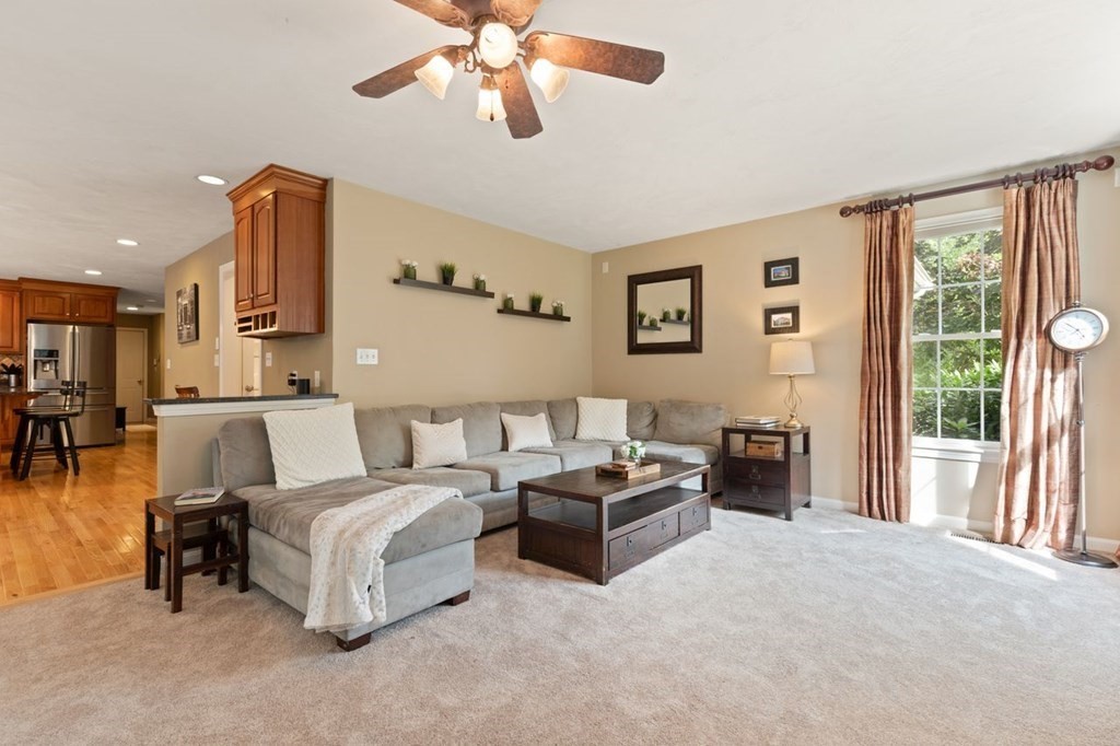 3 Symphony Drive Easton, MA 02356 - Photo 10 of 42 a living room with furniture and a large window