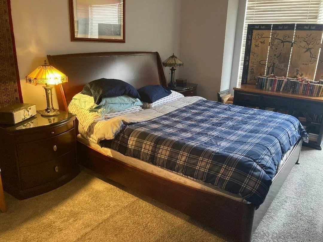 5845 Friars Road, Unit 1206 San Diego, CA 92110 - Photo 5 of 9 a bedroom with a bed and lamp with window